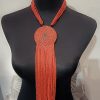 WhatsApp Image 2026-01-16 at 16.00.58 (1) Collier de Perles - médaillon et franges - corail