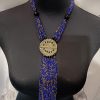 Collier de Perles – médaillon orné et franges - bleu